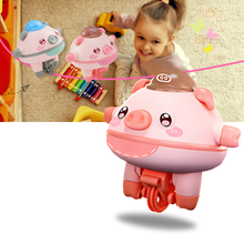 Carica l'immagine nel visualizzatore di Gallery, Maialino in monociclo giocattolo - Ozerty